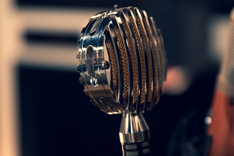 Vintage microphone symbolizing the unsung pioneers of audio engineering