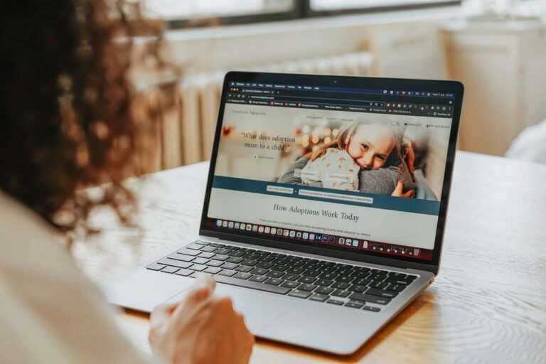 Woman researching a website on a laptop -- Troozer com legitimacy review